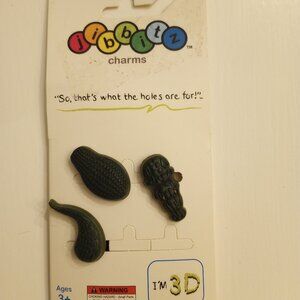 New, Three Piece Crocodile Jibbitz and Four Piece Jibbitz Set Of Peace Signs